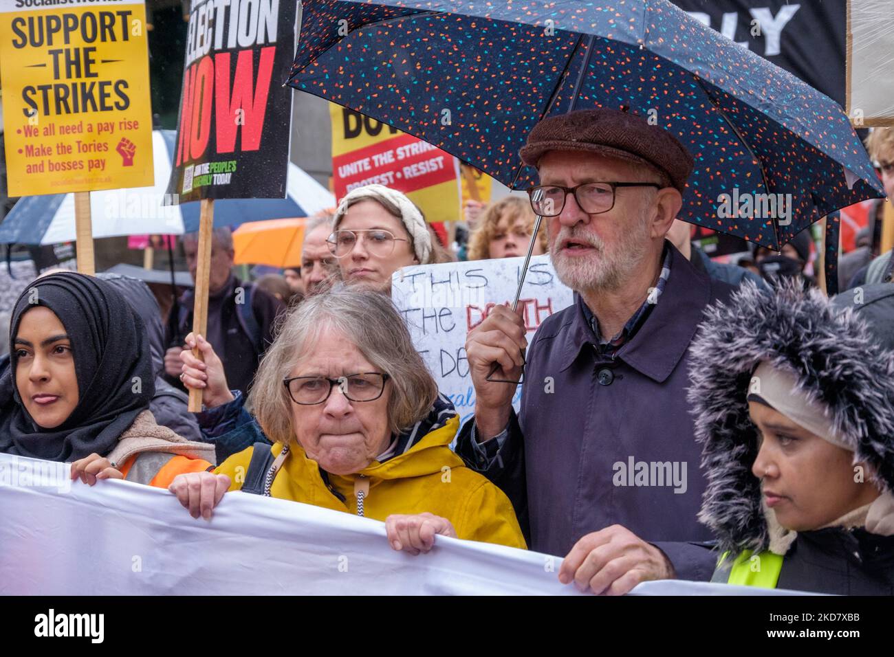 London, UK. 5 Nov 2022. Lindsey German and Jeremy Corbyn behind the main banner. Many groups joined the People's Assembly Against Austerity in their march around Westminster to a rally in Trafalgar Square. They say 'Britain Is Broken' and demand a General Election Now! Among the marchers were many trade unionists, left groups and Labour supporters including Jeremy Corbyn and John McDonnell. Peter Marshall/Alamy Live News Stock Photo