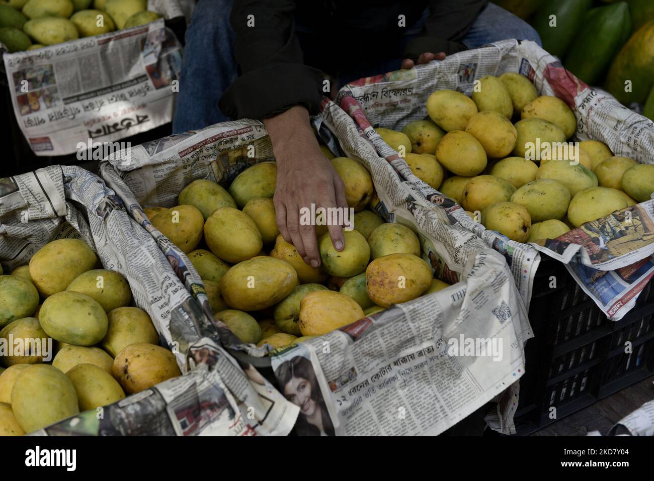 Labours work inside Mango wholesale market shop in Kolkata, India, 18