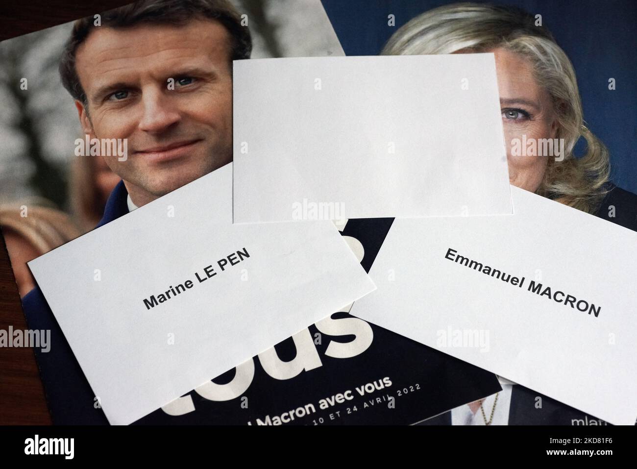 Several ballot papers are pictured on the programs of the finalists of the first round : 'Emmanuel Macron', 'Marine Le Pen' and a blank ballot. Many french voters are undecided for their vote on Sunday 24th April between Emmanuel Macron (current president - right) and Marine Le Pen (far right) for the 2nd round of the French presidential election. Left voters hesitate between Macron, abstention and a blank ballot. Some right voters also don't know for whom they will vote if they don't vote blank or will be abstentionnnists. For now Macron is the favourite to win this election for a 2nd mandate Stock Photo