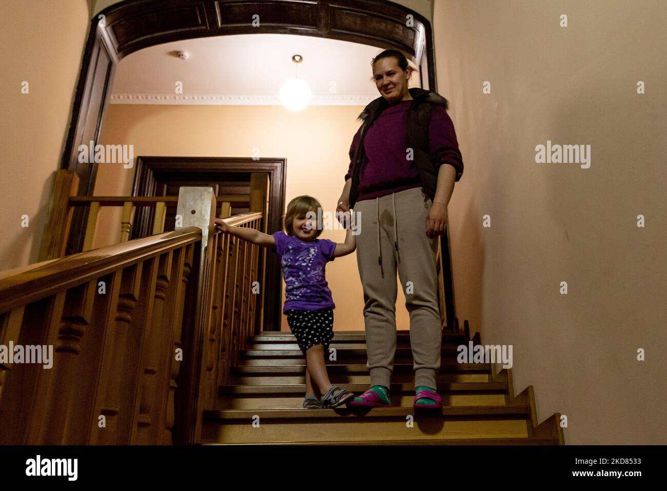 Ukrainian domestic refugees who escaped from Kharkiv area to relative safety of Nadyby, Lviv Oblast, Ukraine walk on the stairs of thier shelter on April 21, 2022. Since the Russian Federation invaded Ukraine, the conflict forced over 10 million people to flee their homes, both internally and externally. Greek-Catholic Church in Nadyby near Lviv hosts dozens of mothers with children who fled the war in eastern part of Ukraine and supports many more refugees in the area. The families found shelter in the Center for the Pastoral Care of Priests and Monks in Nadyby. (Photo by Dominika Zarzycka/Nu Stock Photo