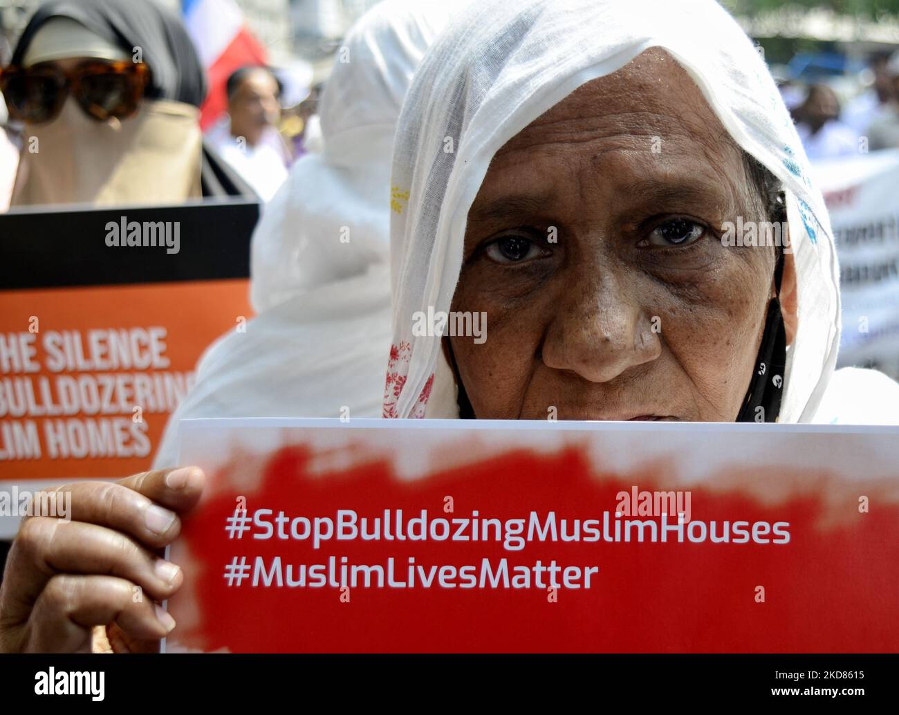 Religious leaders of different faith along with social activists carry posters, banners, placards in a protest rally against the recent bulldozer demolition of an illegal construction in Delhi Jahangirpuri area, Kolkata, India, on April 22, 2022. (Photo by Indranil Aditya/NurPhoto) Stock Photo