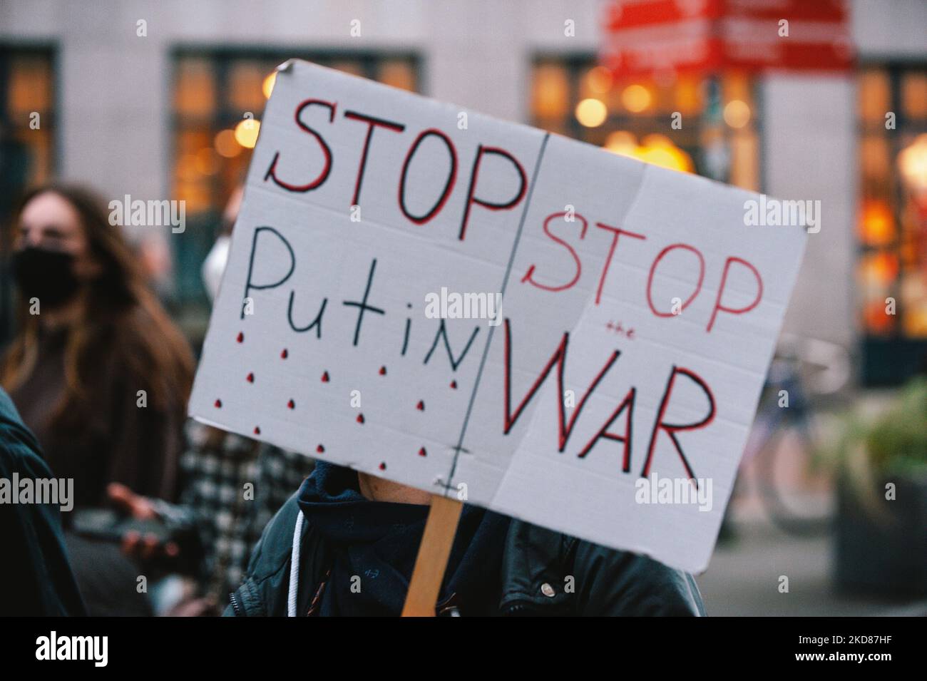 a sign of ' stop putins war' is seen during the antiwar protest from students of Bonn university in Bonn, Germany on April 22, 2022' (Photo by Ying Tang/NurPhoto) Stock Photo