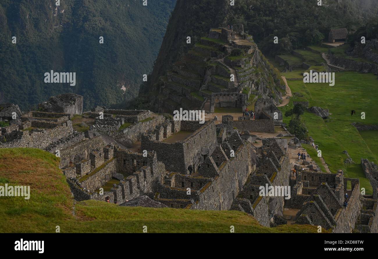 View of the residential section of the ancient Inca city of Machu Picchu located in the Andes at an altitude of 2,430 meters (7,970 feet). The most famous icon of the Inca civilization was declared a Peruvian Historical Sanctuary in 1981, a UNESCO World Heritage Site in 1983, and in 2007 was then declared one of the Seven New Wonders of the World. On Wednesday, 20 April 2022, in Historic Sanctuary of Machu Picchu, Urubamba Province, Peru. (Photo by Artur Widak/NurPhoto) Stock Photo