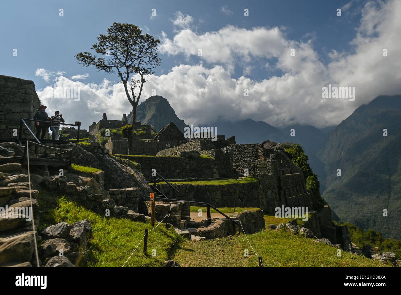 View of the ancient Inca city of Machu Picchu located in the Andes at an altitude of 2,430 meters (7,970 feet). The most famous icon of the Inca civilization was declared a Peruvian Historical Sanctuary in 1981, a UNESCO World Heritage Site in 1983, and in 2007 was then declared one of the Seven New Wonders of the World. On Wednesday, 20 April 2022, in Historic Sanctuary of Machu Picchu, Urubamba Province, Peru. (Photo by Artur Widak/NurPhoto) Stock Photo