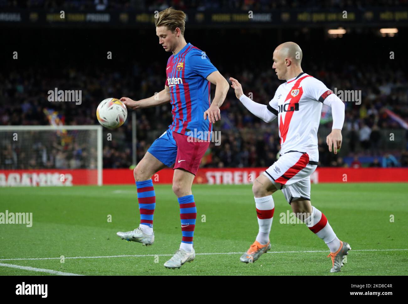 Frenkie de Jong and Isi Palazon during the match between FC Barcelona and Raypo Vallecano, corresponding to the week 21 of the Liga Santander, played at the Camp Nou Stadium, in Barcelona, on 24th April 2022. (Photo by Joan Valls/Urbanandsport /NurPhoto) Stock Photo