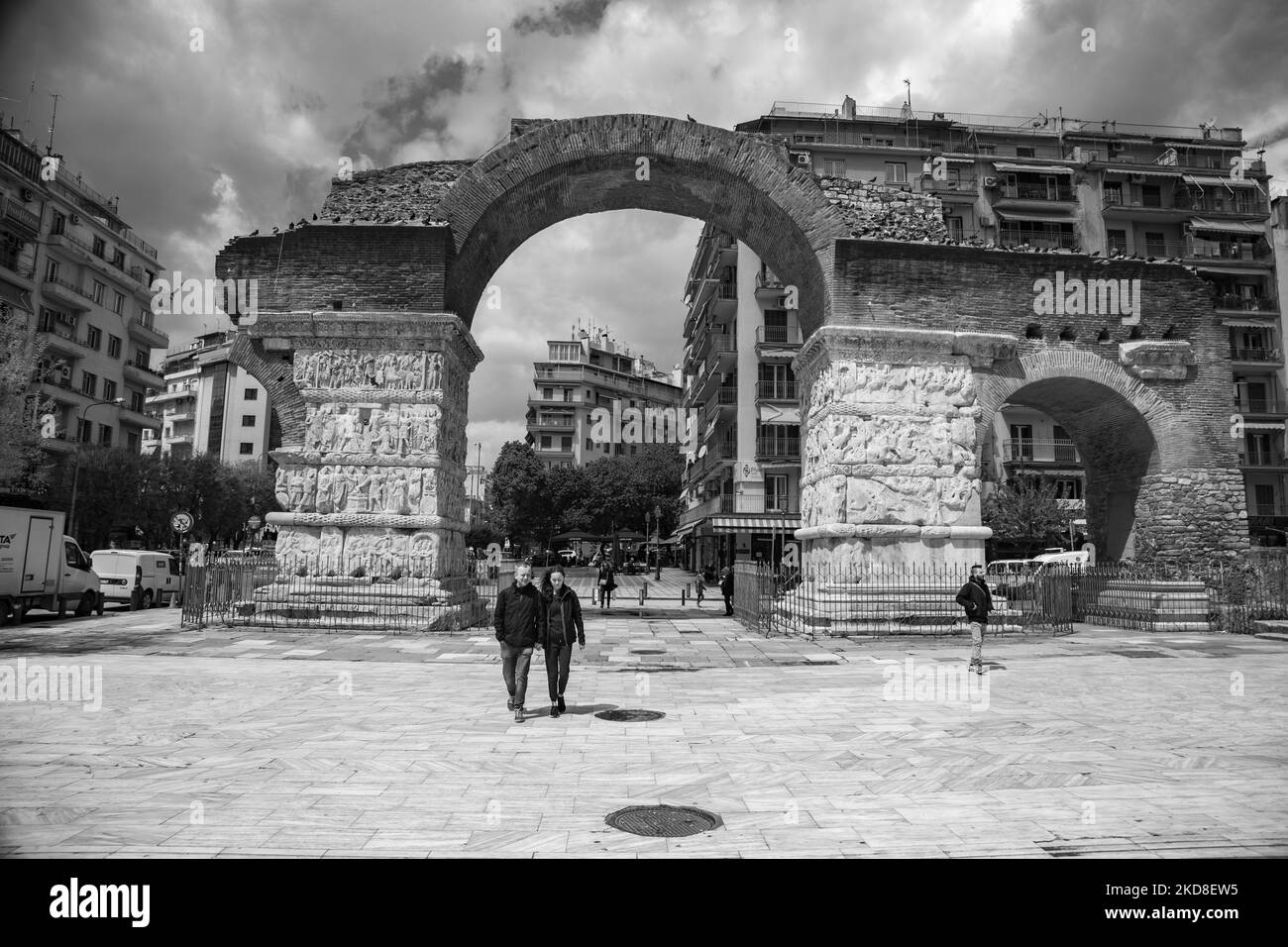 Black and White picture B/W of Kamara. The Arch of Galerius known as Kamara near Rotunda in Thessaloniki. The monument was commissioned by the Roman emperor Galerius and depicts with marble carved sculptural panels, reliefs the celebration of victory over Narses (Narseh) the seventh emperor in the Sassanid Persian Empire in 299 AD. The Arch of Galerius stands on what is now the intersection of Egnatia and Dimitriou Gounari streets. Construction of the arch was spanned the years 298 and 299 AD; it was dedicated in 303 AD to celebrate the victory of the tetrarch Galerius, over the Sassanid Persi Stock Photo