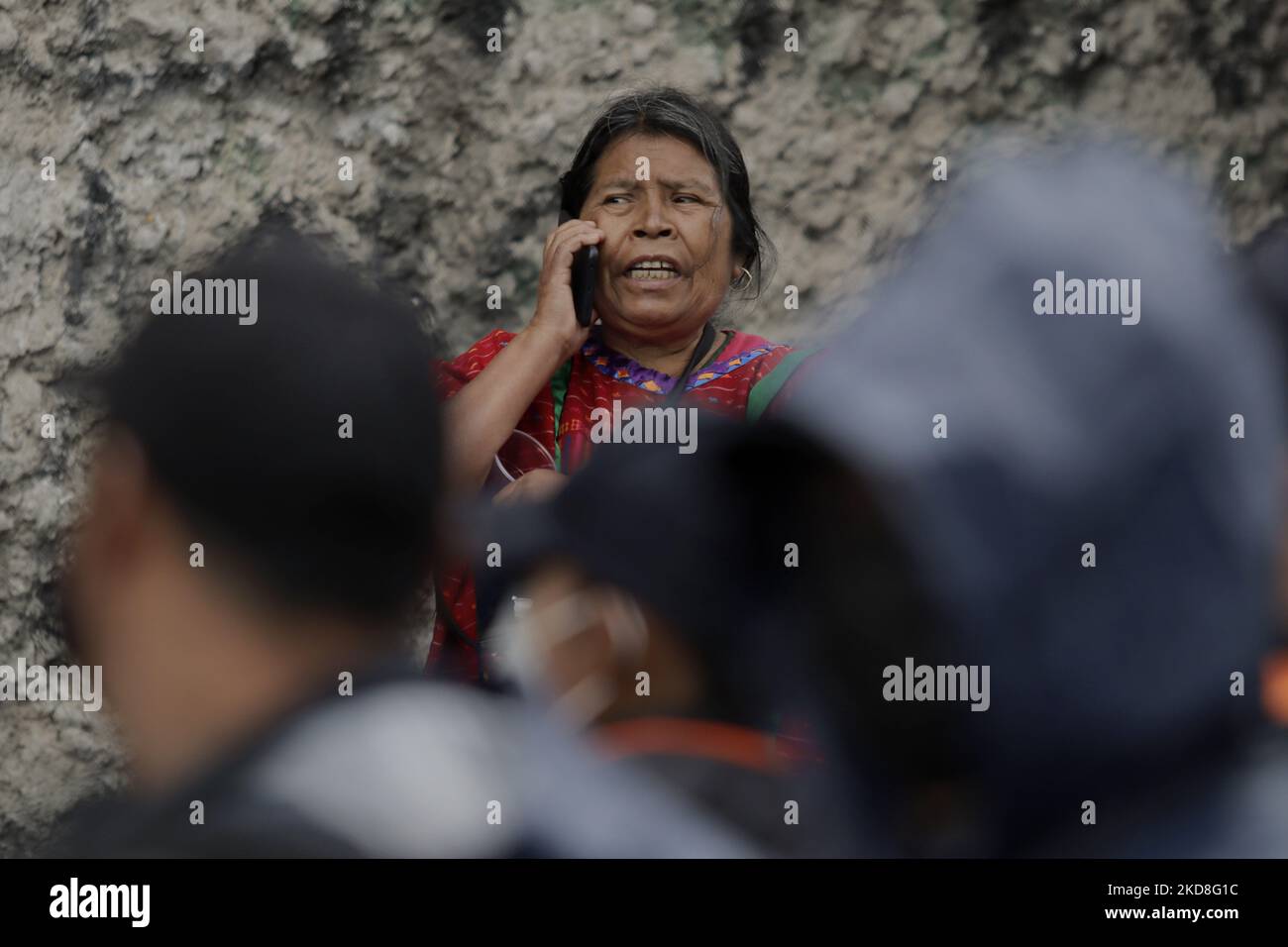 Members of the Triqui community of Copala, Oaxaca, were encapsulated by police after being evicted from an encampment they had maintained for 15 months on Avenida Juárez, Mexico City. After these events, they were once again encapsulated outside a building that gave them refuge for one night in the street of Mapimí and Plomo, in the Valle Gómez neighbourhood. (Photo by Gerardo Vieyra/NurPhoto) Stock Photo