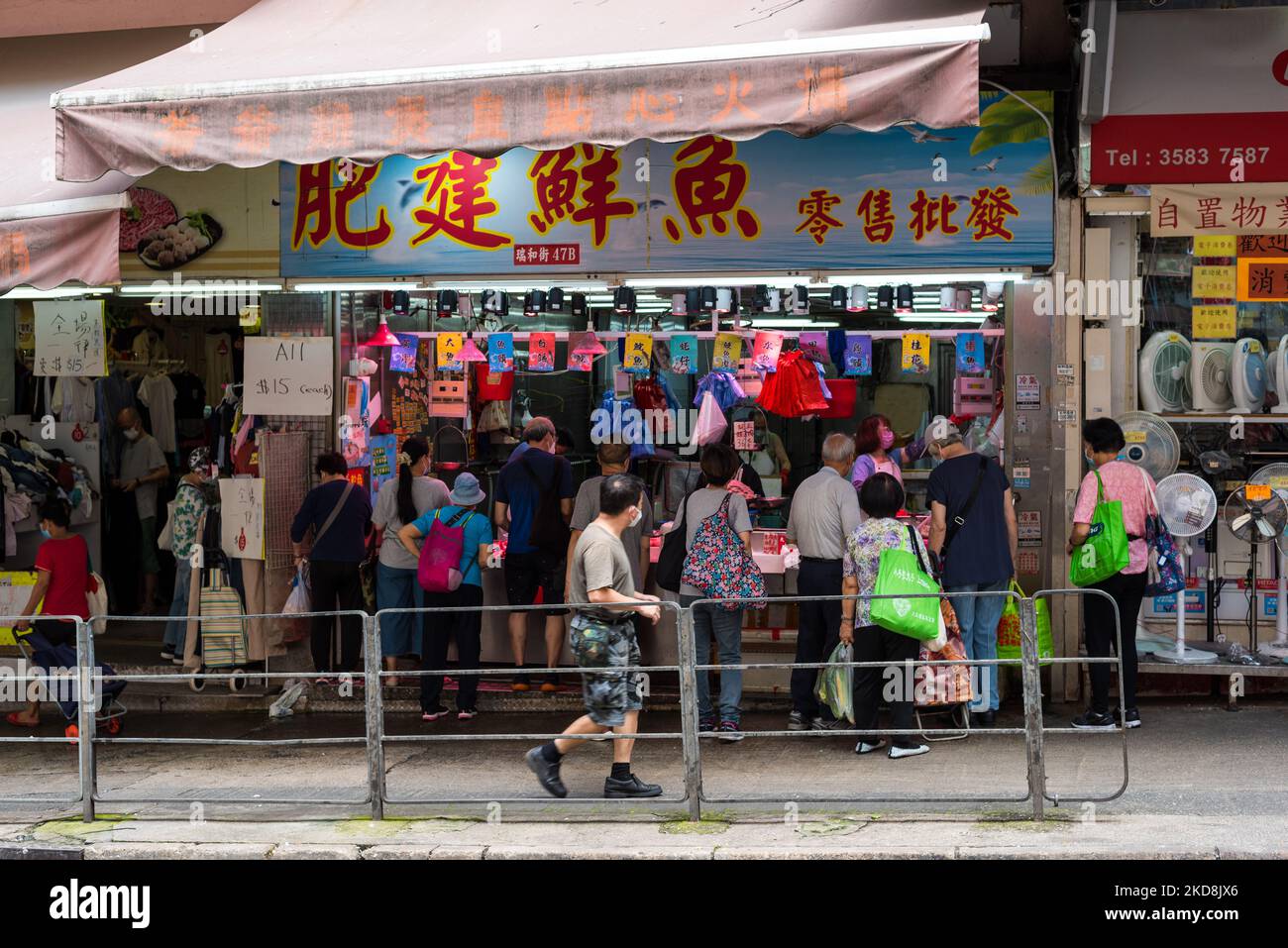 Hong Kong, China, 28 Apr 2022, Customers queue up at a Fujianese fish