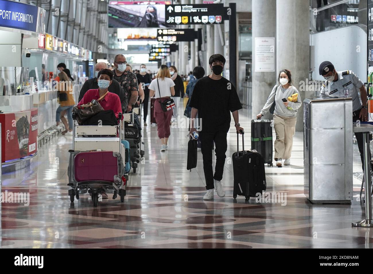 Tourists wearing face masks as a preventive measure against the spread