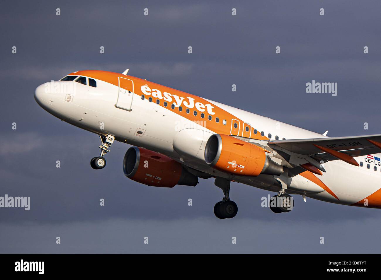 EasyJet Europe Airbus A319 aircraft as seen during taxiing, rotate and take off phase flying as departs from Amsterdam Schiphol Airport. The A319 has the registration OE-LQN. EasyJet is a British multinational low cost airline group with headquarters at London Luton Airport while EasyJet Europe Airline GmbH is based in Vienna Austria with a fleet of 127 airplane. The aviation industry is showing recovery and increased demand after the Covid-19 Coronavirus pandemic measures have been easing across the worlds. Amsterdam, Netherlands on April 27, 2022 (Photo by Nicolas Economou/NurPhoto) Stock Photo