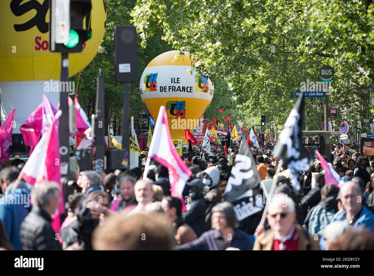 Several thousand demonstrators waving union and political party flags participated in the traditional May Day demonstration in Paris (Labor Day) marking International Workers Day, starting at Place de la République in Paris, May 1, 2022. (Photo by Samuel Boivin/NurPhoto) Stock Photo