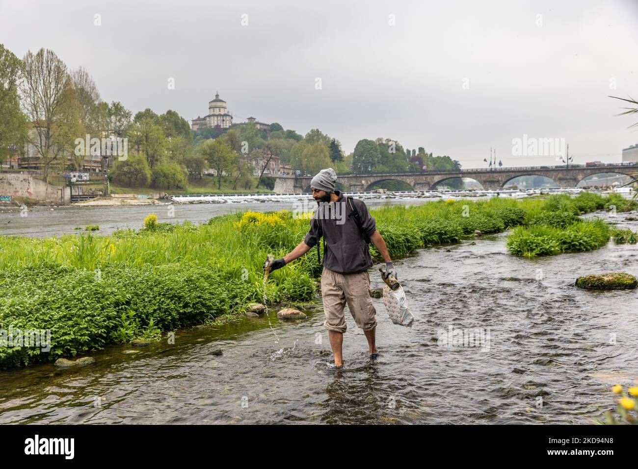 Matthew Deluca, a Canadian working in Italy, clean the water of the