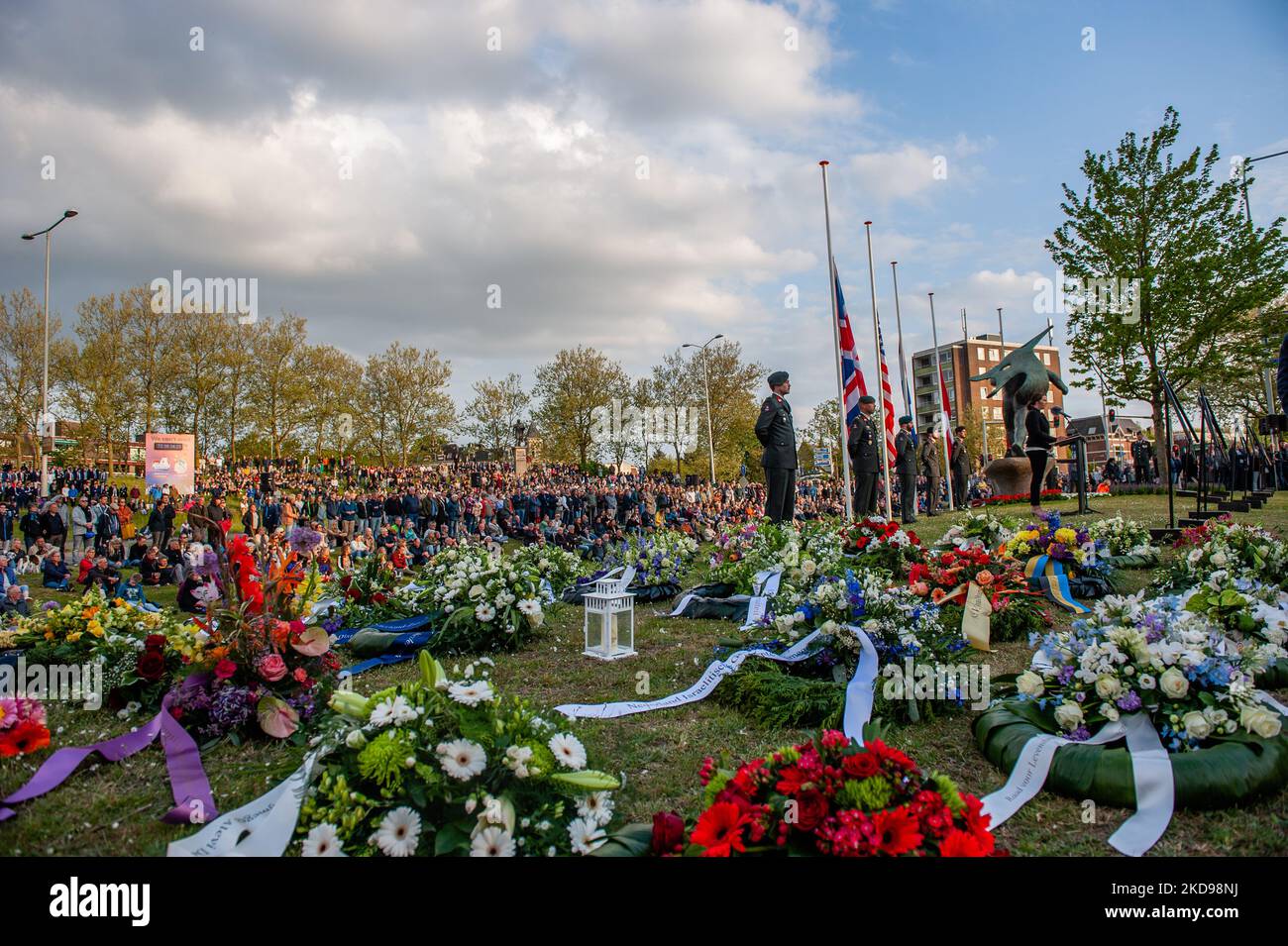 People are gathered around the 'Keizer Traianusplein', where two monuments in remember of the victims of WWII stand up, during the Remembrance Day held again in Nijmegen, on May 4th, 2022. (Photo by Romy Arroyo Fernandez/NurPhoto) Stock Photo
