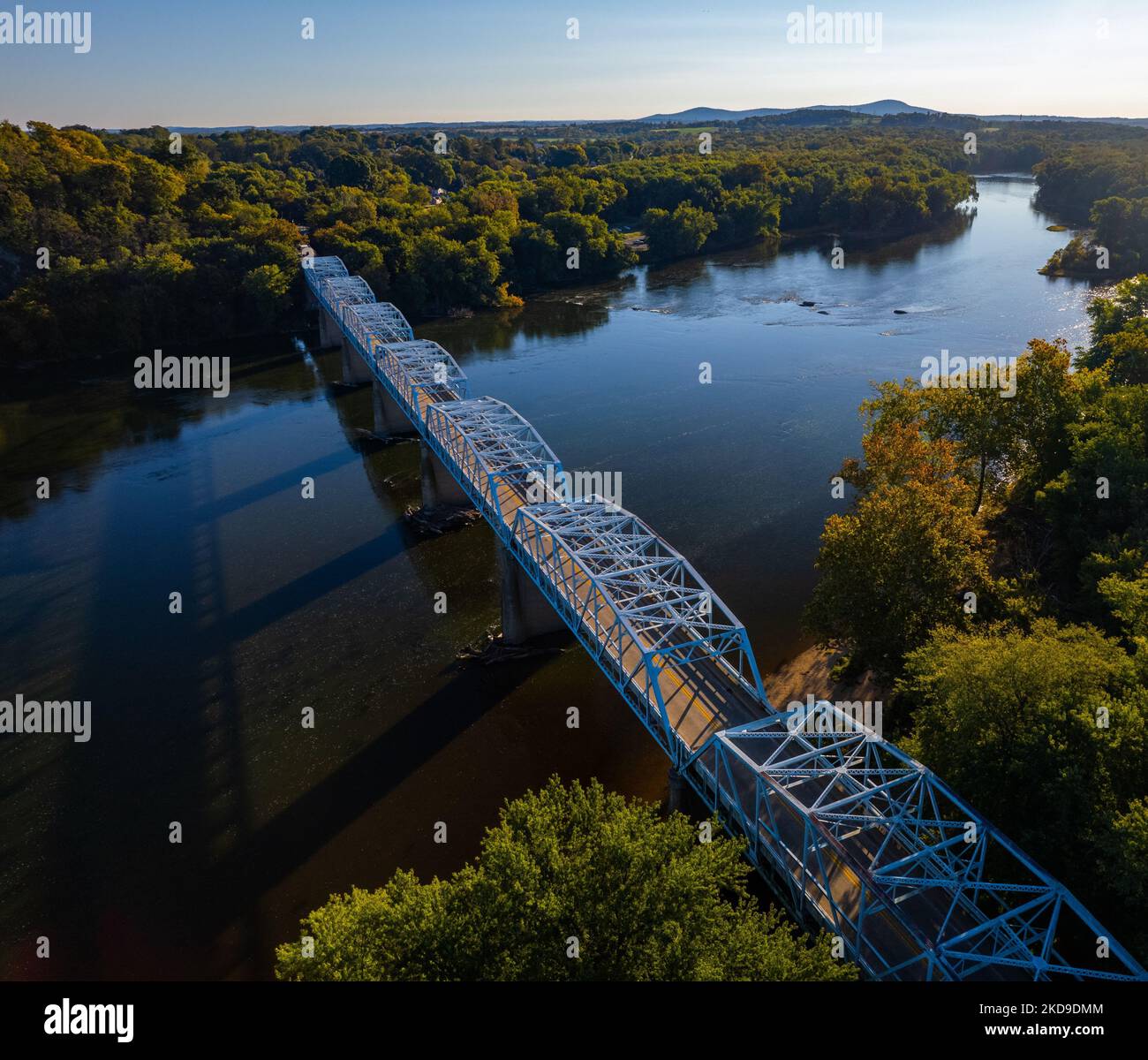 An aerial view of the Point of Rocks bridge over Seneca Lake at sunrise