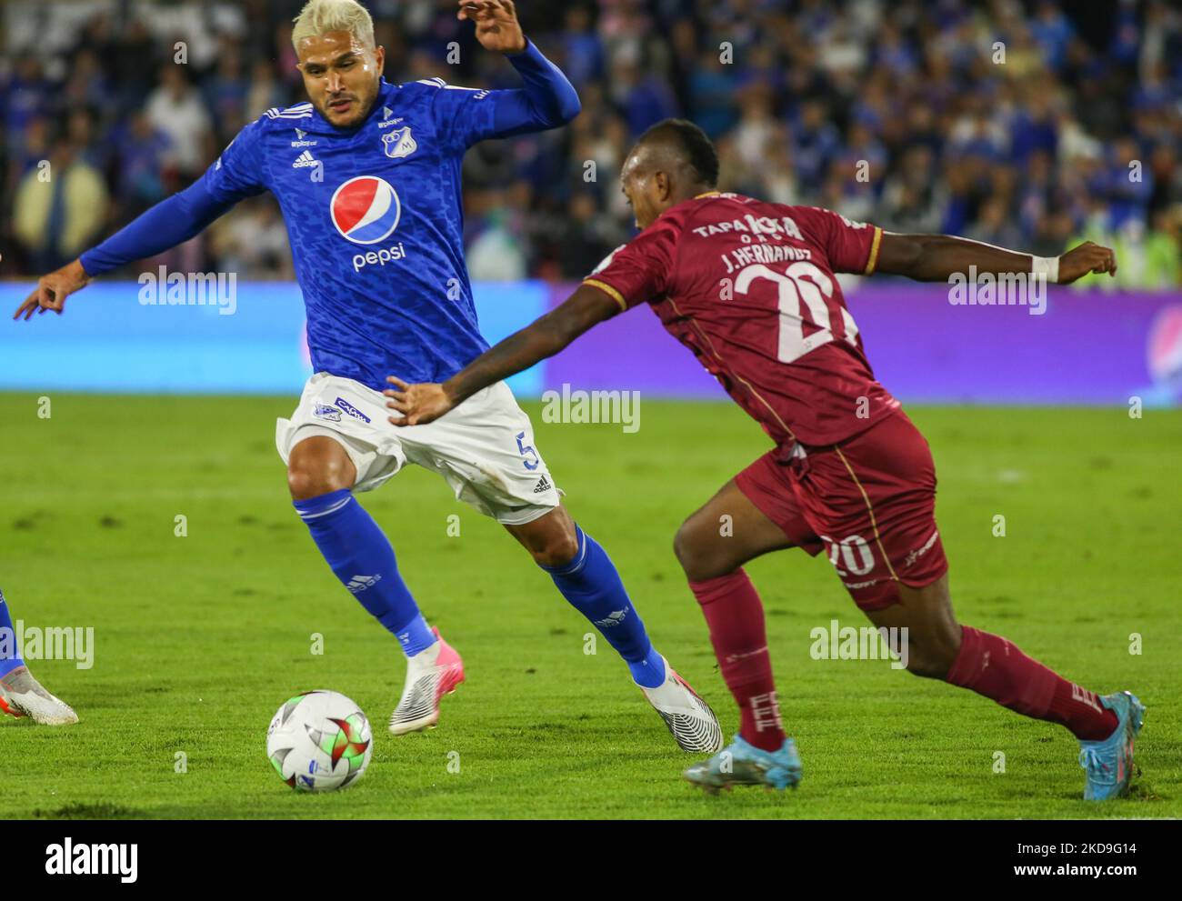 Larry Vasquez of Millonarios and Junior Hernandez of Tolima fight for the ball during the Millonarios vs Tolima BetPlay DIMAYOR League match at Estadio Nemesio Camacho El Campin stadium in Bogota, Colombia on May 8, 2022, match that would end 0 - 0. (Photo by Daniel Garzon Herazo/NurPhoto) Stock Photo
