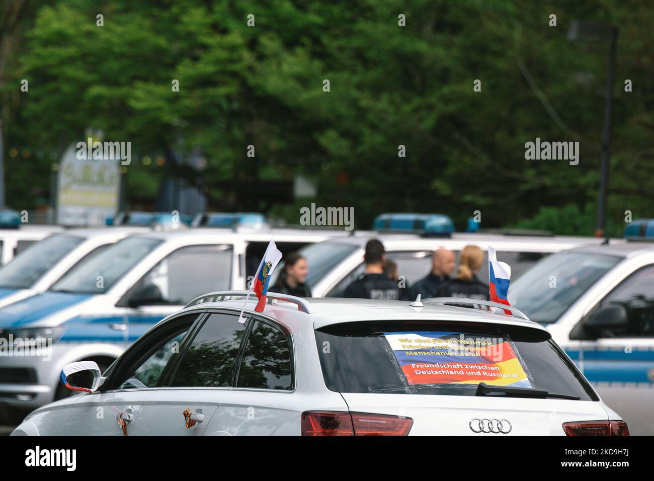 police cars are seen parked before the start of Pro Russian car parade to comenorate the 77th anniversary of V-E Day which marks the end of World War II in Europe in 1945 in Cologne, Germany on May 8, 2022 (Photo by Ying Tang/NurPhoto) Stock Photo