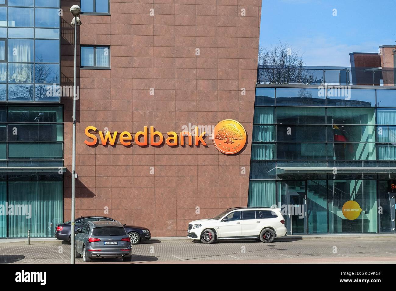 Swedbank logo on the bank building is seen in Klaipeda, Lithuania on 30 April 2022 (Photo by Michal Fludra/NurPhoto) Stock Photo