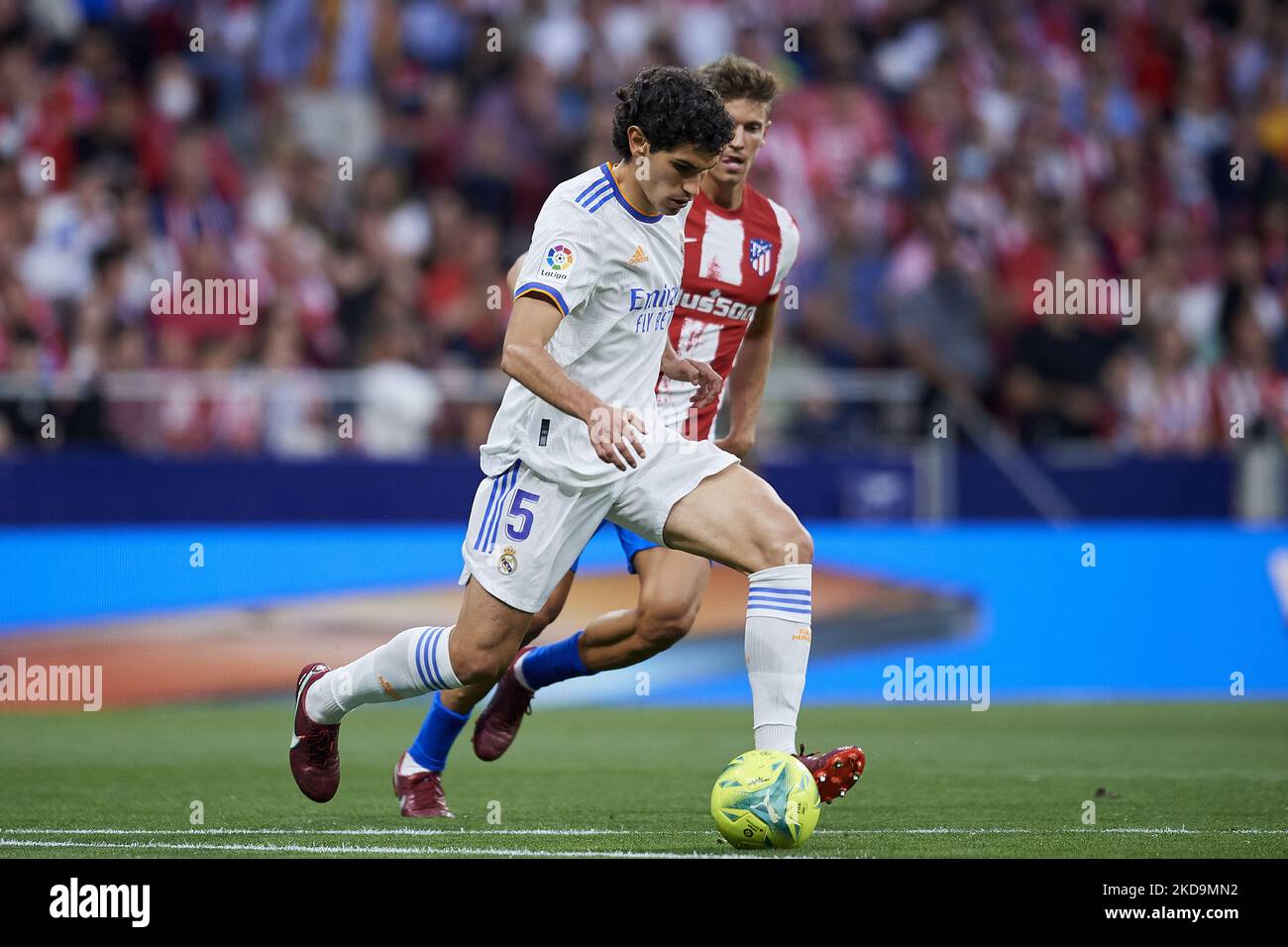 Jesus Vallejo of Real Madrid with the ball during the La Liga Santander match between Club Atletico de Madrid and Real Madrid CF at Estadio Wanda Metropolitano on May 8, 2022 in Madrid, Spain. (Photo by Jose Breton/Pics Action/NurPhoto) Stock Photo