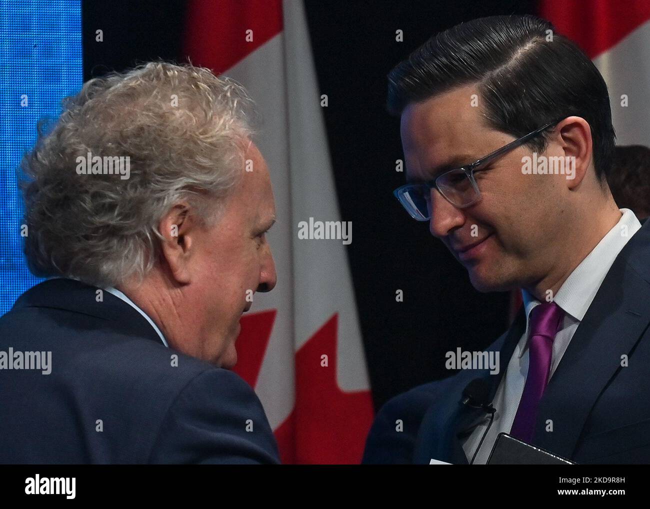 Conservative leadership candidates (LR) Jean Charest and Pierre