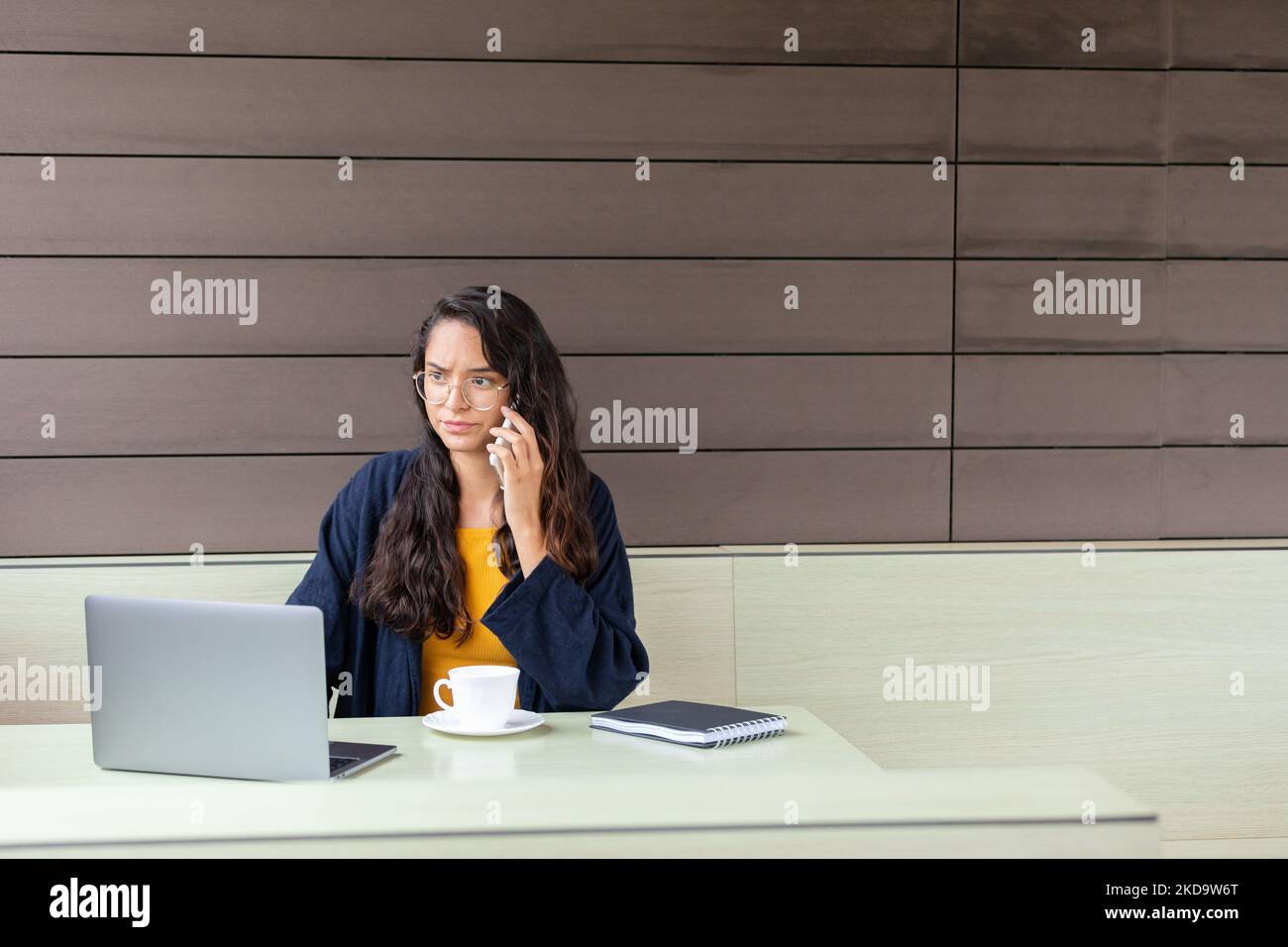 Shocked female freelancer using netbook Stock Photo