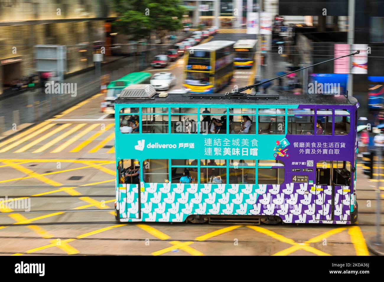 A Hong Kong tramway decorated with a publicity for the food delivery company Deliveroo passes in Central Hong Kong in a panned shot, on May 15, 2022. (Photo by Marc Fernandes/NurPhoto) Stock Photo