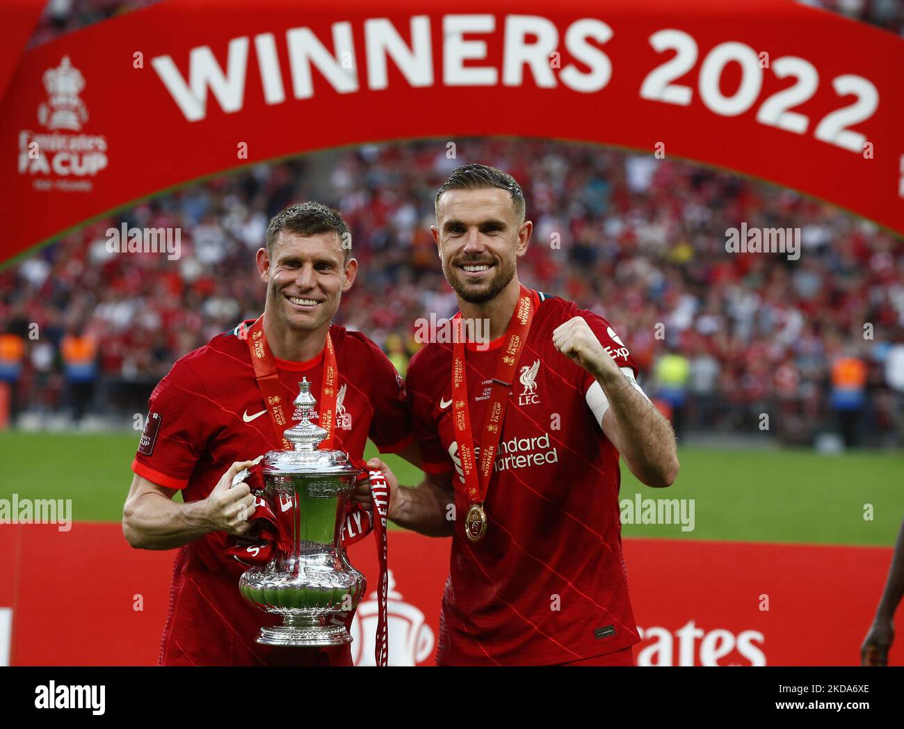 Liverpool's James Milner holds the FA Cup with Liverpool's Jordan Henderson after their sides 6-5 penalty shoot-out after a 0-0 draw in normal time FA Cup Final between Chelsea and Liverpool at Wembley Stadium , London, UK 14th May , 2022 (Photo by Action Foto Sport/NurPhoto) Stock Photo