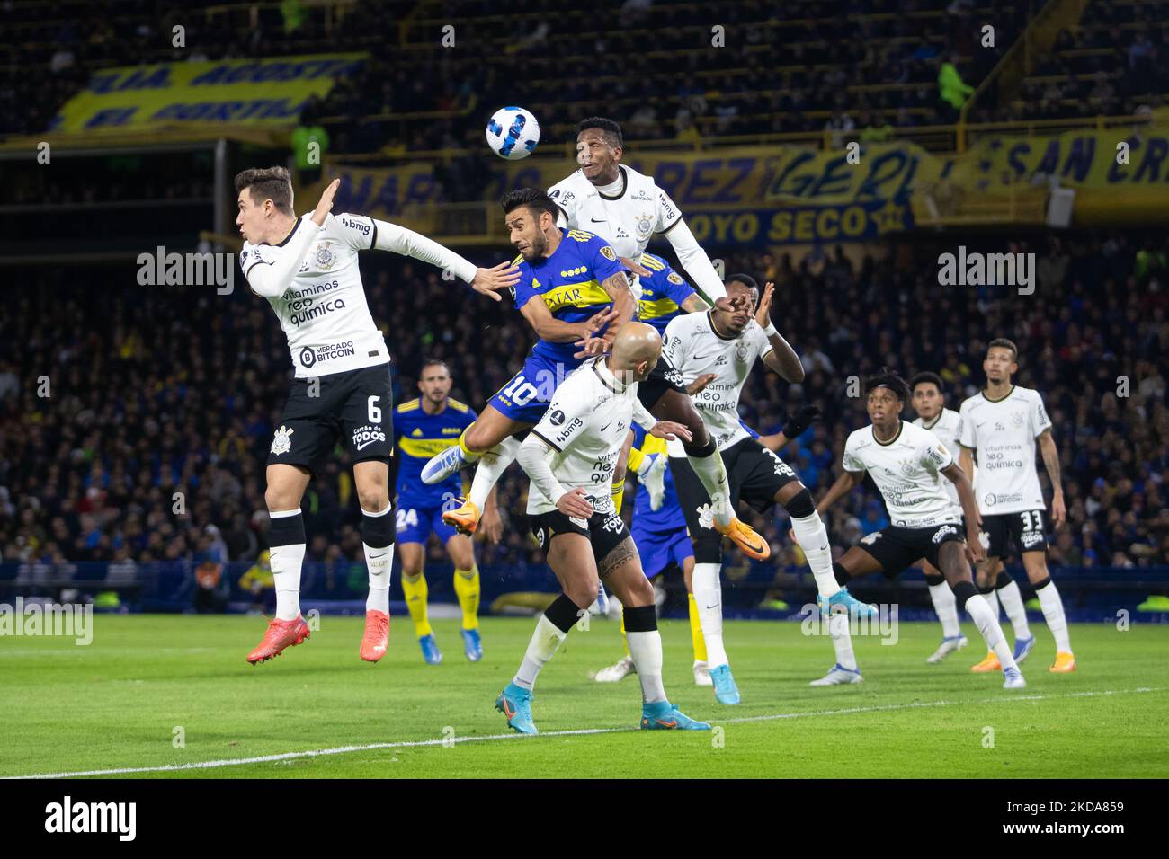 Players of Argentina's Boca Juniors and Brazil's Corinthians in action