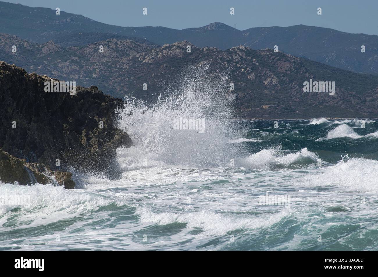 An aerial view of sea waves breaking rocky beach Stock Photo - Alamy