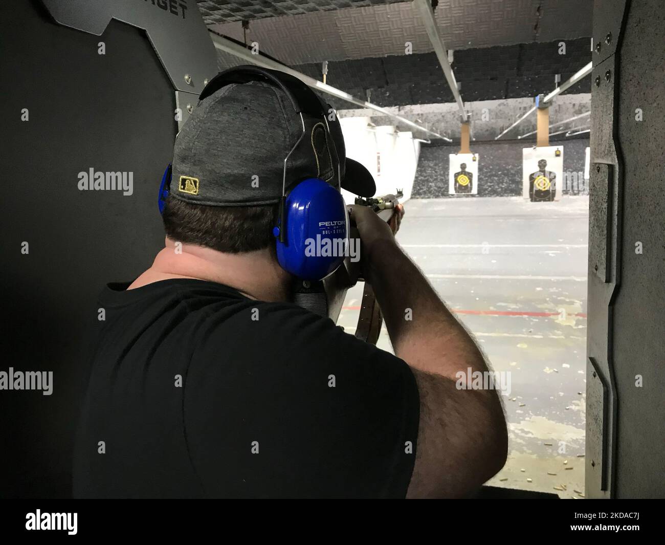 A closeup of a man target shooting with an M1 Garand. Stock Photo