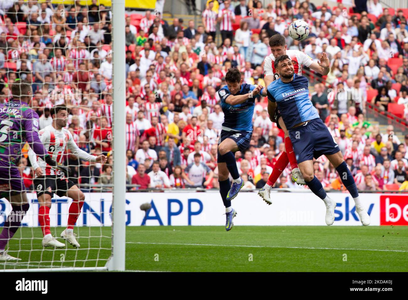Ross Stewart of Sunderland and Ryan Tafazolli of Wycombe Wanderers Wanderers battle for the ball during the Sky Bet League 1 match between Sunderland and Wycombe Wanderers at Wembley Stadium, London on Saturday 21st May 2022. (Photo by Federico Maranesi/MI News/NurPhoto) Stock Photo
