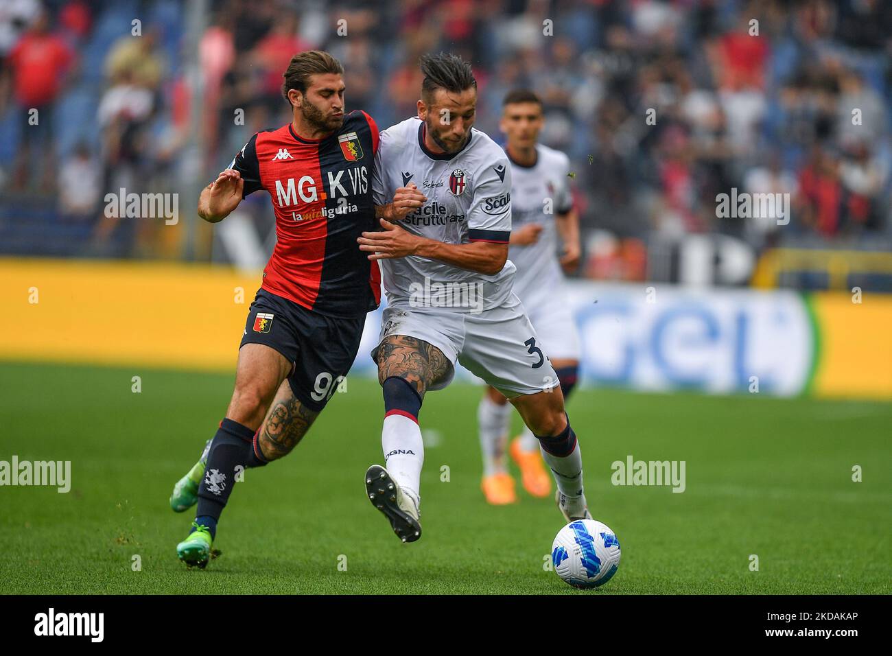 Genoa, Italy. 30 April 2022. Antonio Candreva of UC Sampdoria competes for  the ball with Pablo Galdames of Genoa CFC during the Serie A football match  between UC Sampdoria and Genoa CFC.
