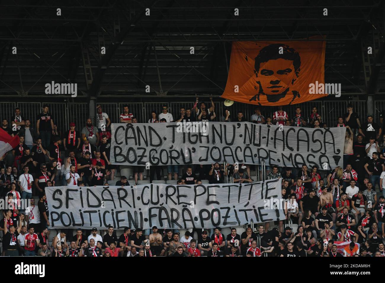 Supporters of Dinamo Bucuresti showing a banner mocking at the the first two teams in Romania's Liga 1 during Universitatea Cluj vs. Dinamo Bucuresti, 21 May 2022, disputed on Cluj Arena Stadium, Cluj Napoca (Photo by Flaviu Buboi/NurPhoto) Stock Photo