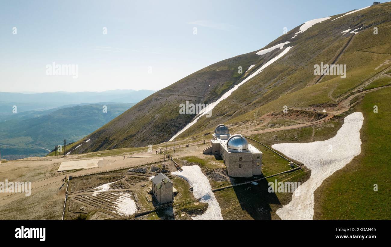 A drone view of Abruzzo Astronomical Observatory at 2.200 m above the sealevel, in Campo Imperatore, Italy, on May 21, 2022. (Photo by Manuel Romano/NurPhoto) Stock Photo