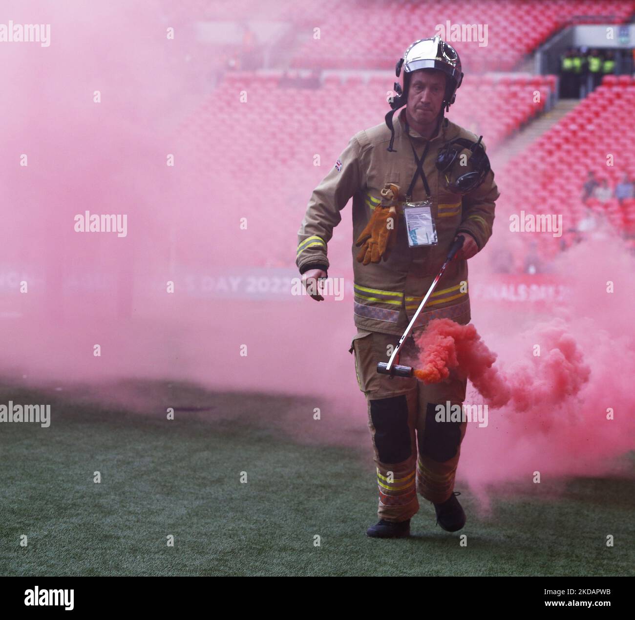 LONDON, ENGLAND - MAY 22: Firefighter hold flare during The Buildbase 