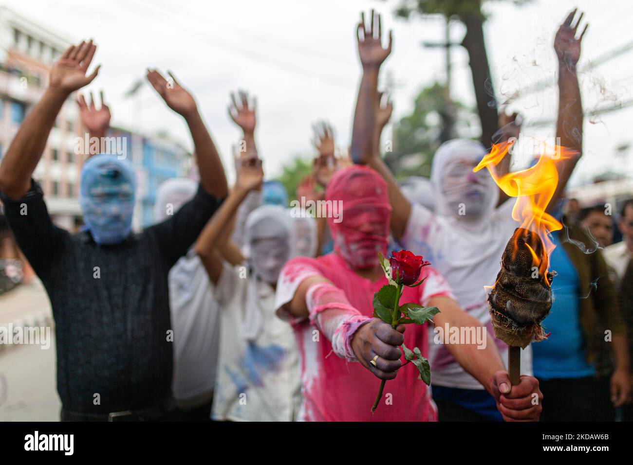 Nepalese youth performs a play while protesting against caste system and justices for six men from lower caste who were killed by vicious crowd in Rukum district two years ago in Kathmandu, Nepal on Tuesday, May 24, 2022. (Photo by Rojan Shrestha/NurPhoto) Stock Photo
