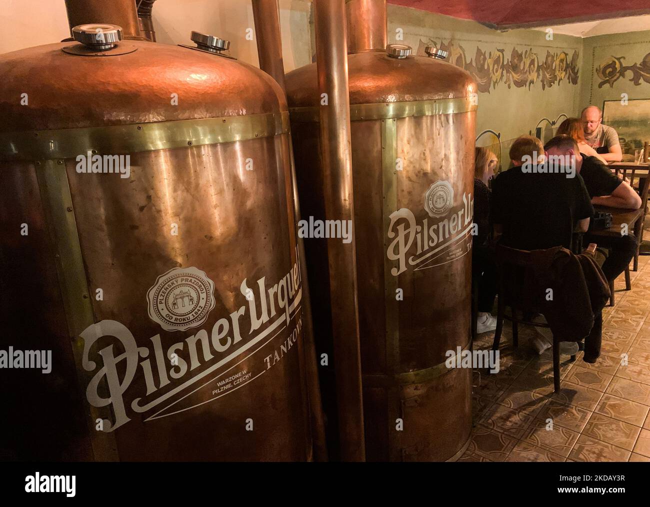 Pilsner Urquell logo is seen on beer vat in restaurant in Krakow, Poland on May 24, 2022. (Photo