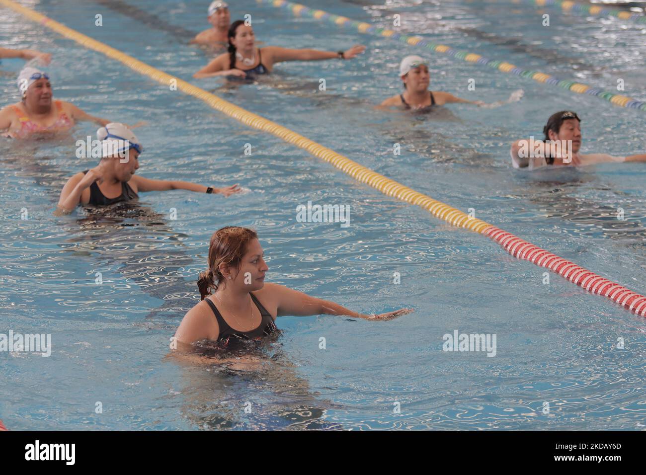 A group of inhabitants of Milpa Alta in Mexico City, during an exhibition of Aqua Zumba or zumba in the pool on the occasion of the 20th anniversary of the Tecoxpa pool in that town. (Photo by Gerardo Vieyra/NurPhoto) Stock Photo