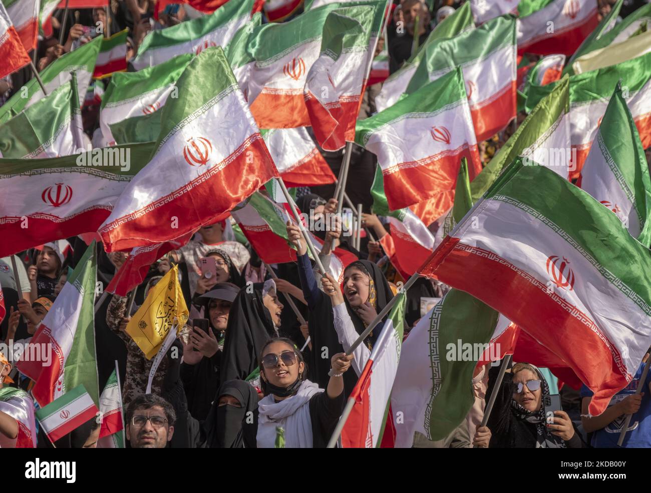 Khamenei Supporters Female supporters of Iran’s Supreme Leader Ayatollah Ali Khamenei wave ...
