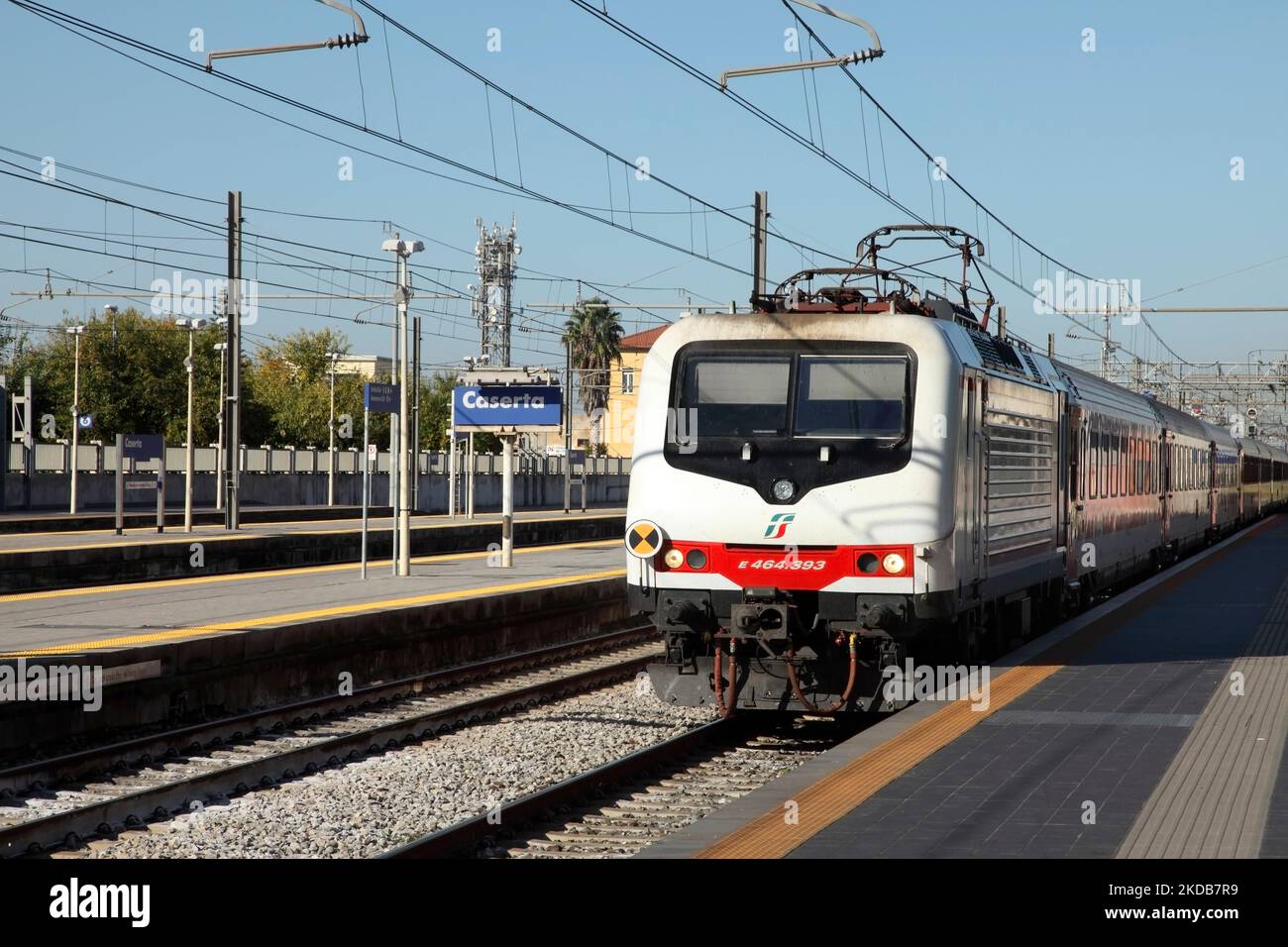 Italian railways class E464 electric locomotive with Intercity train at Caserta station, Italy. Stock Photo