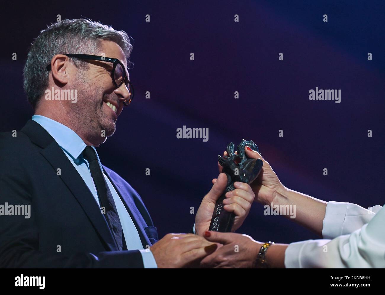 John Powell, an Anglo-American composer, best known for his music for animated films, receives the Wojciech Kilar Award for lifetime achievement at a gala at the ICE Krakow Congress Center. On Saturday, May 28, 2022, in Krakow, Poland. (Photo by Artur Widak/NurPhoto) Stock Photo