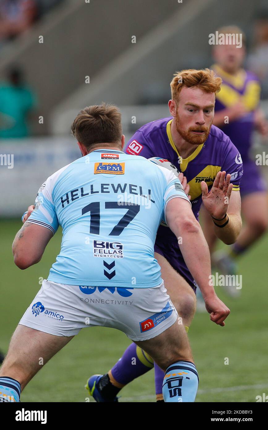 Alex Donaghy of Newcastle Thunder runs in to Ben Hellewell of Featherstone Rovers during the BETFRED Championship match between Newcastle Thunder and Featherstone Rovers at Kingston Park, Newcastle on Thursday 2nd June 2022. (Photo by Chris Lishman/MI News/NurPhoto) Stock Photo