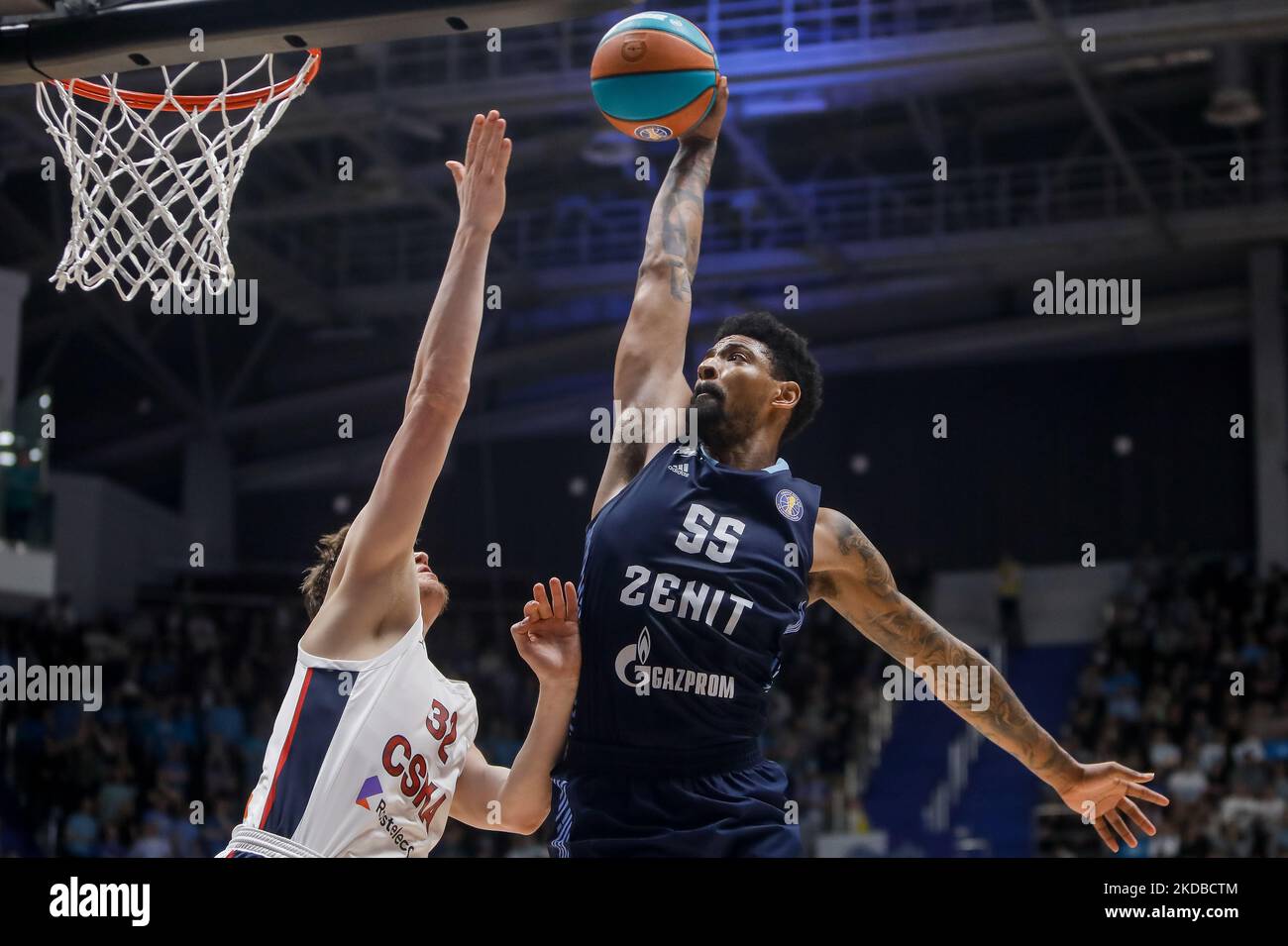 Jordan Mickey (R) of Zenit scores a dunk over Jonas Christopher Jerebko of CSKA Moscow during the VTB United League basketball sixth match of Final series between Zenit St. Petersburg and CSKA Moscow on June 6, 2022 at Sibur Arena in Saint Petersburg, Russia. (Photo by Mike Kireev/NurPhoto) Stock Photo