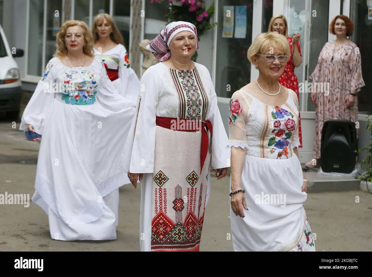 Ukrainian age plus models wearing traditional embroidered clothing display an ethnic collection 'Our Ivanka' by Ukrainian designer Natlia Datzko, amid Russia's invasion of Ukraine, in Odesa, Ukraine 5 June 2022. The fashion show was organized by the Institute of Modern Ladies, the co-founder of which noted that in such a difficult time, such events are very important for raising the spirit of women, as local media informed. Models paraded in unique outfits with national motives as elements of hand embroidery, ribbons, braid, lace and other national decorations. (Photo by STR/NurPhoto) Stock Photo