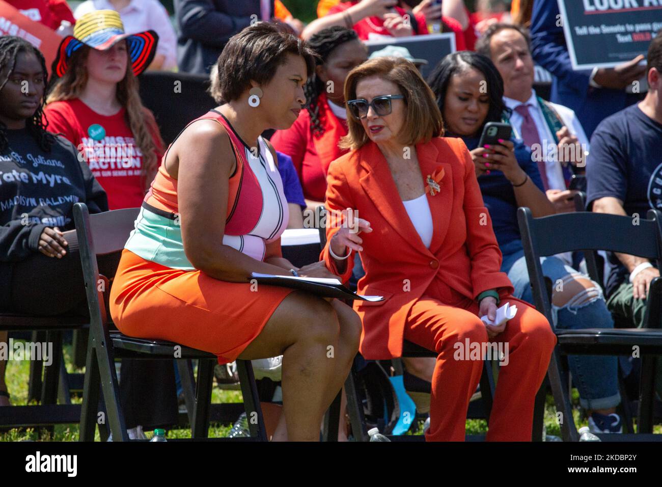 Washington, D.C. Mayor Muriel Bowser speaks with Speaker of the United States House of Representatives Nancy Pelosi during a rally near the U.S. Capitol on June 8, 2022, calling for Congressional action on gun safety in the wake of continued mass shootings (Photo by Bryan Olin Dozier/NurPhoto) Stock Photo