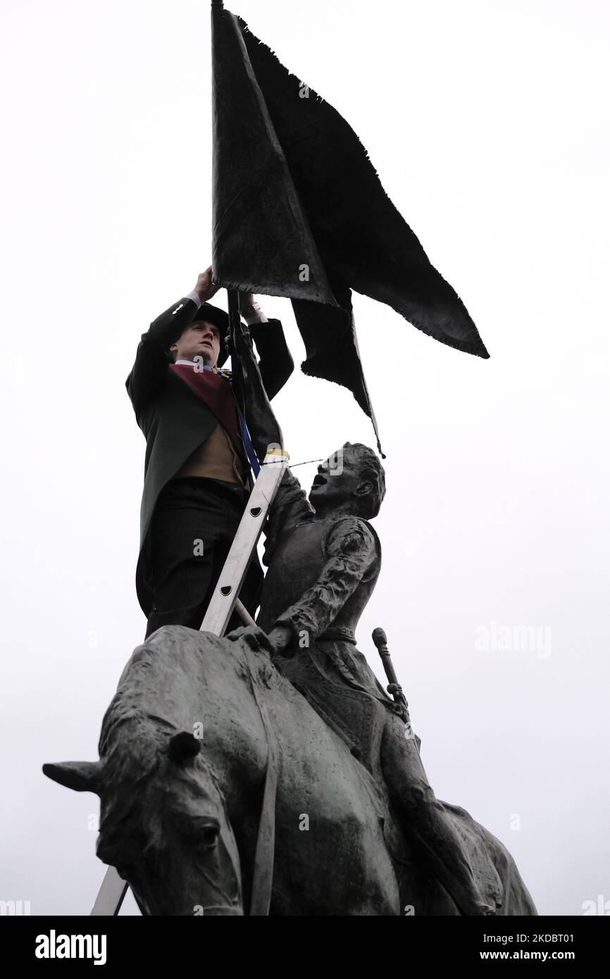 Hawick, UK. 09.Jun.2022. Hawick 2022, Greig Middlemass, climbs the Horse Memorial at the