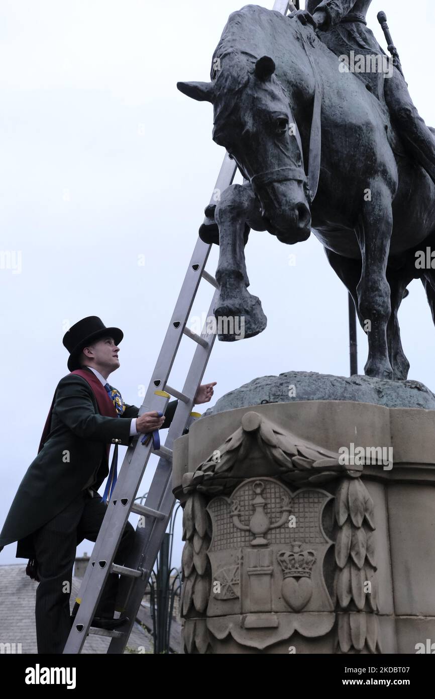 Hawick, UK. 09.Jun.2022. Hawick 2022, Greig Middlemass, climbs the Horse Memorial at the