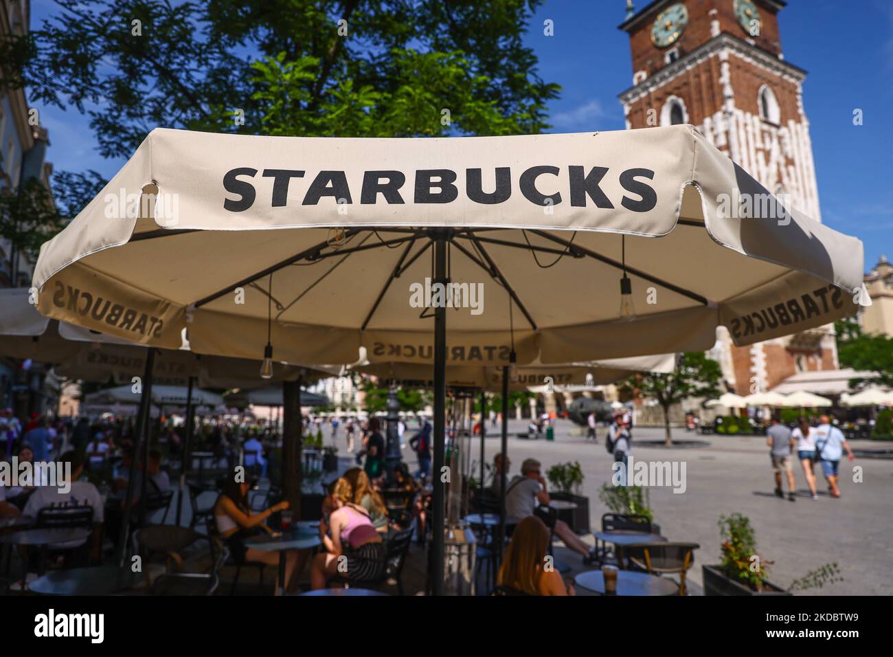Starbucks Coffee shop summer garden at the Main Square in Krakow