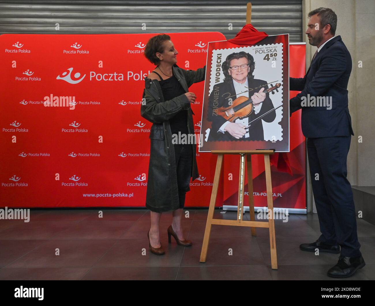 Andrzej Bodziony, vice-president of the management board of Poczta Polska (Polish Post mail company) and Katarzyna Wodecka-Stubbs, president of the Zbigniew Wodecki Foundation during the presentation of the postage stamp from the series 'Polish Music Stars' dedicated to the Polish singer Zbigniew Wodecki, at a post office Kraków 1. On Friday, June 10, 2022, in Krakow, Poland. (Photo by Artur Widak/NurPhoto) Stock Photo