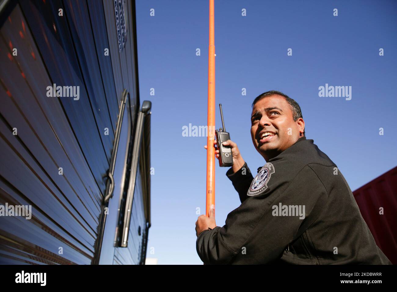 An officer with the U.S. Customs and Border Protection Office of Field ...