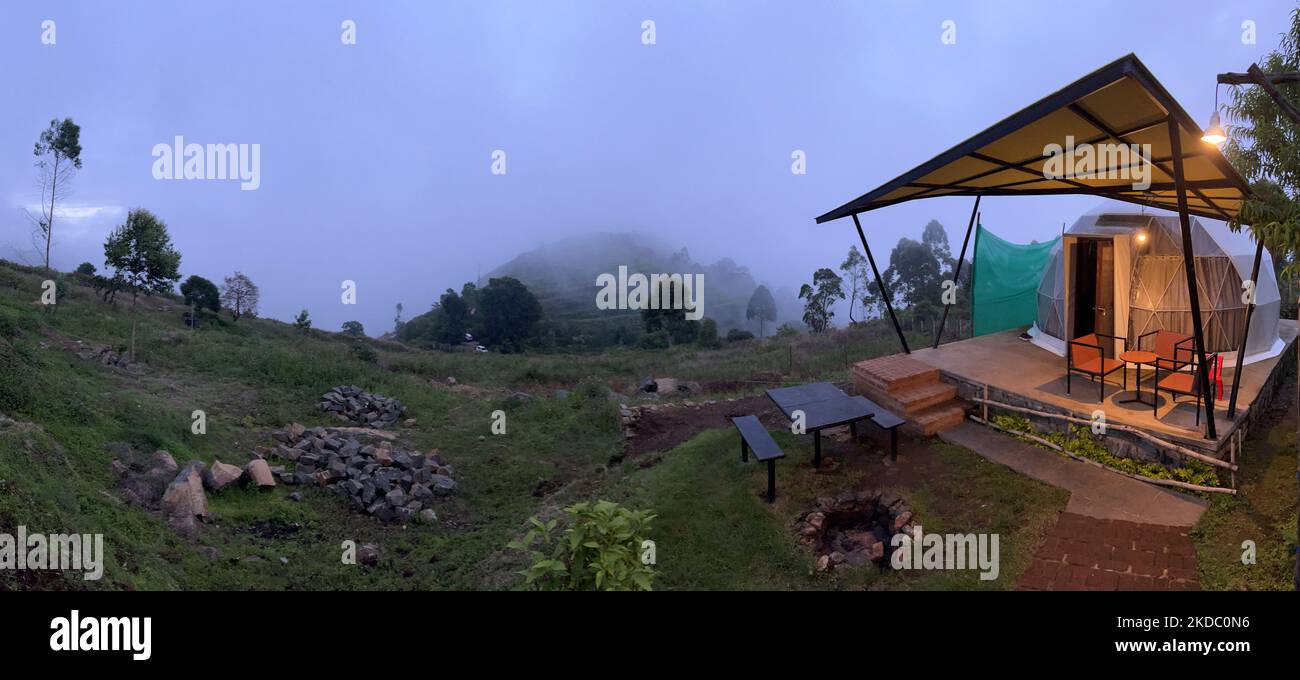 Evening scenery alongside an 'Igloo' shaped yurt dome at a upscale 'glamping' (fancy camping